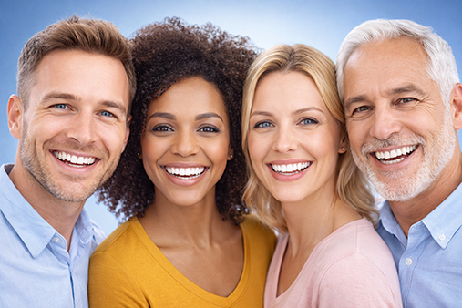 Diverse adults smiling confidently with healthy white teeth